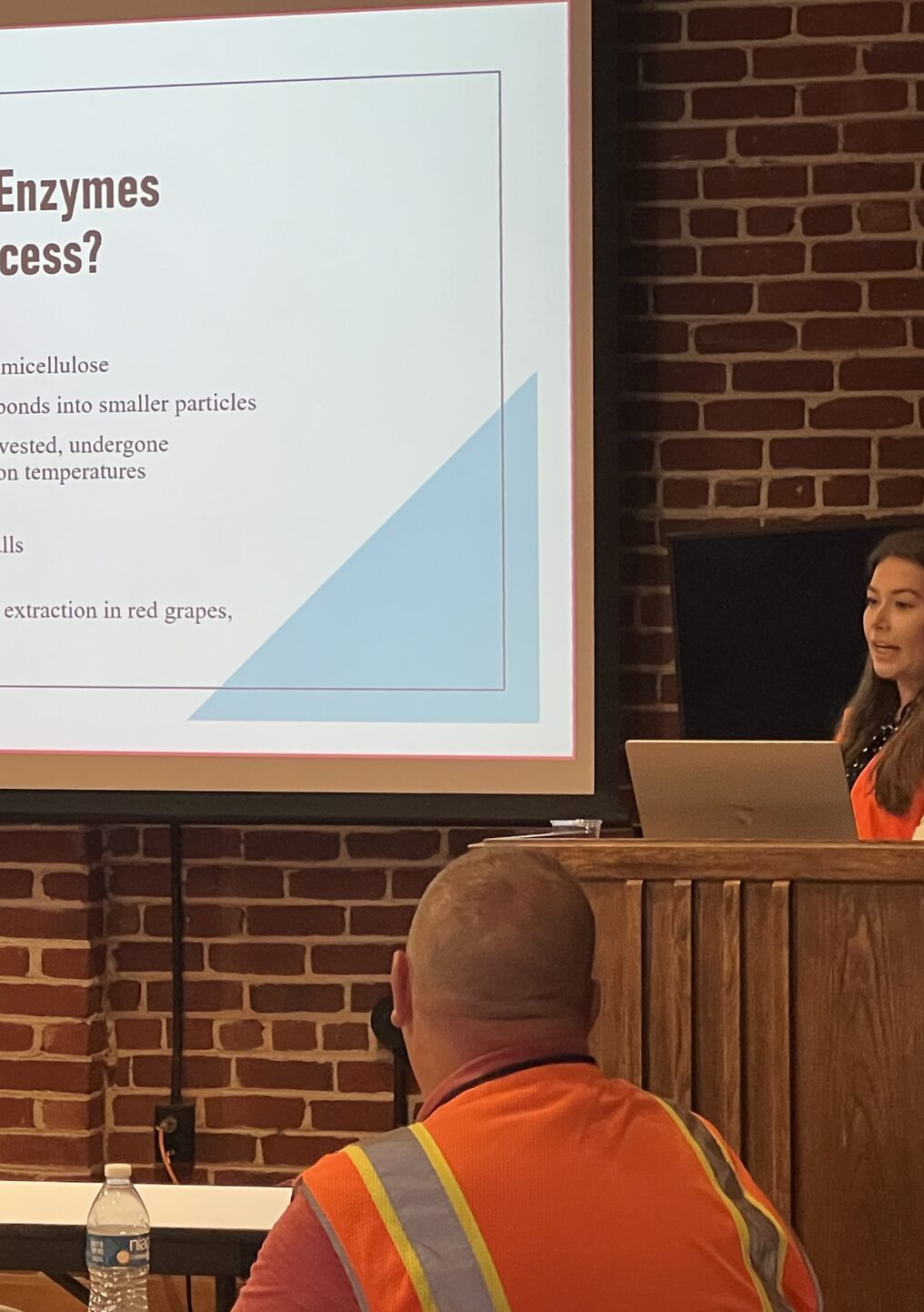 Intern presenting winemaking research to colleagues